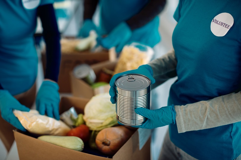 Volunteers organising food at a food bank