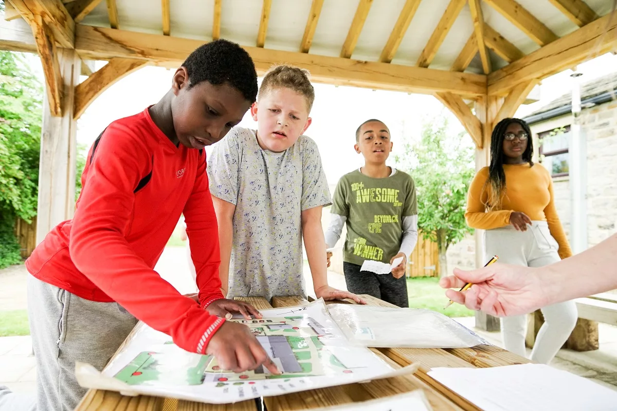 Children orienteering at Lineham Farm